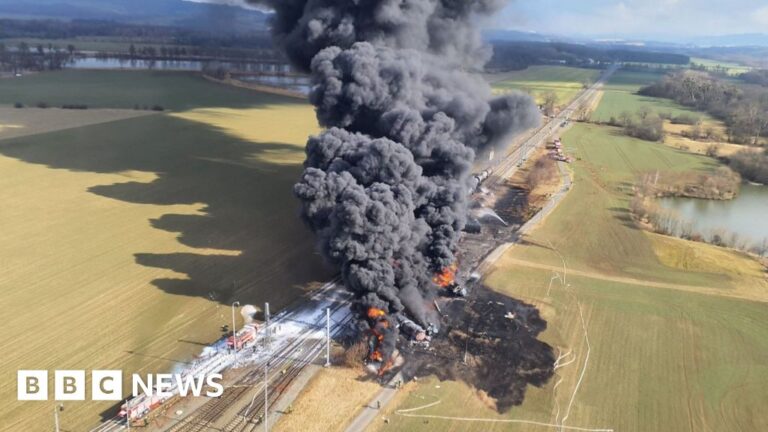 Firefighters tackle large toxic train fire